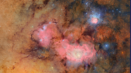 This image combines 678 separate images taken by NSF-DOE Vera C. Rubin Observatory in just over seven hours of observing time. Combining many images in this way clearly reveals otherwise faint or invisible details, such as the clouds of gas and dust that comprise the Trifid nebula (top right) and the Lagoon nebula, which are several thousand light- years away from Earth. Credit: NSF-DOE Vera C. Rubin Observatory